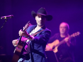 Brett Kissel performs during the Halo High Water benefit concert at the Southern Alberta Jubilee Auditorium in Calgary on Aug. 4, 2013. (Lyle Aspinall/QMI Agency)