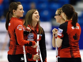 Canada's skip Rachel Homan (second left) shares a laugh with her team during their draw against Scotland at the World Women's Curling Championships in Saint John, N.B., on Tuesday, March 18, 2014. (Mathieu Belanger/Reuters)