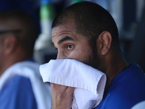 Blue Jays starter Ricky Romero wipes his face in the dugout yesterday against the Tigers. (Veronica Henri/QMI Agency)