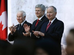 Canada's Governor General David Johnston (L), Prime Minister Stephen Harper, Minister of National Defence Rob Nicholson take part in a welcome home ceremony for soldiers returning from Afghanistan, in Ottawa March 18, 2014. (REUTERS/Blair Gable)