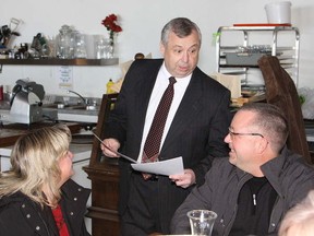 JOHN LAPPA/THE SUDBURY STAR
Ward 5 Coun. Ron Dupuis, middle, talks to supporters prior to announcing on Tuesday that he is running for mayor of Greater Sudbury. See video at www.thesudburystar.com.