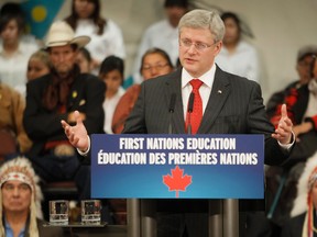 Prime Minister Stephen Harper speaks during an announcement at Kainai High School. Harper was announcing an agreement with the Assembly of First Nations to reform the First Nations education system. Lyle Aspinall photo/QMI Agency.