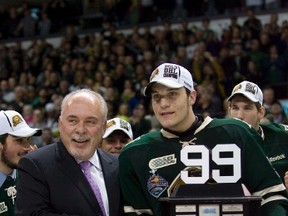 OHL Commissioner David Branch presents Bo Horvat with the Wayne Gretzky "99" Award for most valuable player of the 2013 OHL playoffs. The Knights won their 2nd straight OHL title last season, but will be in tough to repeat this year. DEREK RUTTAN/ The London Free Press /QMI AGENCY