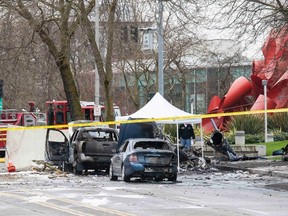 Wreckage is pictured where a television news helicopter crashed near the Space Needle in Seattle, Washington March 18, 2014. REUTERS/David Ryder