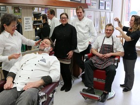 Bruce Bell The Intelligencer
Some of the chefs from local restaurants participating in Spring Countylicious were at John’s Barbershop in Picton to get ready for next Friday’s opening day. Pictured are owner Michelle Mossey shaving Chef Lyndon Johnston of Clara’s at the Clarmount Inn, while stylist Afton Hall trims the locks of Chef Elliot Reynolds of the Hubb at Angelines. Chefs  Lili Sullivan, of East & Main Bistro and Michael Sullivan, of the Restaurant at the Merrill Inn look on.