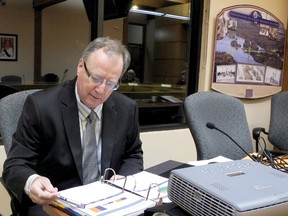 Treasurer Bill McKennan, shown working on TLTI's budget last fall, is one of several senior staff members to leave the township's employ. (WAYNE LOWRIE/The Recorder and Times).