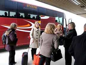 Train passengers board buses at the Via Rail Station in Kingston on Wednesday after native protesters blocked the main CN line west of Kingston.
IAN MACALPINE/KINGSTON WHIG-STANDARD/QMI AGENCY