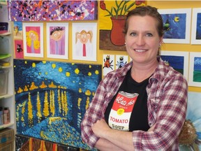 Sarah Ford stands in front of some artwork that hangs on the walls of the 4 Cats Art Studio in Byron. The studio was home to about 40 aspiring artists during their March Break camps. Photo by Brent Boles.