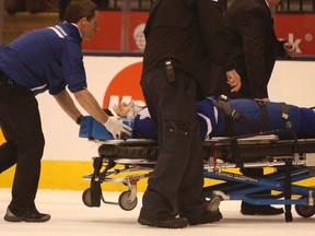 Maple Leafs' Paul Ranger is taken off the ice via stretcher after a boarding by Lightning's Alex Killorn at the ACC Wednesday, March 19, 2014. (Jack Boland/Toronto Sun)