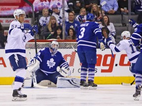 The Lightning players whoop it up after Radko Gudas beat James Reimer with a soft wrist shot from the blue line 59 seconds into the game last night at the ACC. Reimer turned in another sketchy effort after coach Randy Carlyle was critical of his play the night before. (Jack Boland, Toronto Sun)