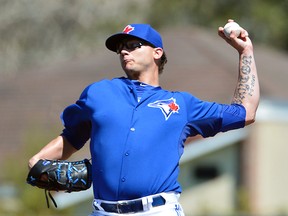 Blue Jays reliever Brett Cecil throws a pitch during Wednesday's game against Philadelphia. (REUTERS)