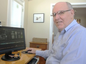 Paul Janes uses computer software to edit together thousands of still pictures, archival footage, narration, sound, and music to make “Trees and Trains: Forest’s First Century,” a documentary film that will premiere at the Kineto Theatre on March 24. HEATHER BROUWER/ SARNIA THIS WEEK/ QMI AGENCY