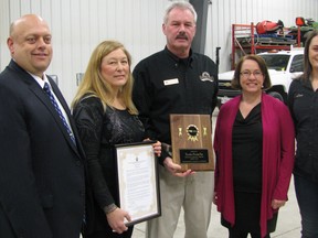 Devolder Farms has been named business of the month by the Chatham-Kent Chamber of Commerce. From left is mayoral representative Coun. Leon Leclair, company founders Diane and Bob Devolder, Chamber presentative Bonny Pigeon, and company business manager Lisa Devolder.PETER EPP/CHATHAM THIS WEEK/QMI AGENCY