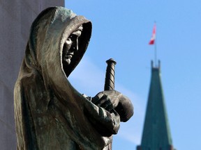 Statue on the steps of the Supreme Court of Canada Oct. 10, 2013.  (Tony Caldwell/QMI Agency)