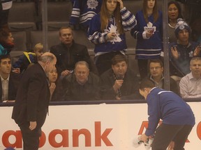 Officials attend to Maple Leafs' Paul Ranger after a boarding by Lightning's Alex Killorn. (JACK BOLAND/Toronto Sun)