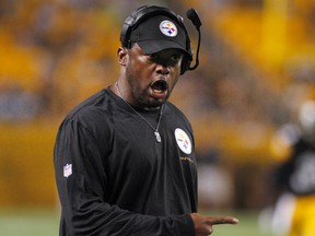 Mike Tomlin of the Pittsburgh Steelers was fined $100,000 last season for stepping onto the field during play. (Justin K. Aller/Getty Images/AFP)