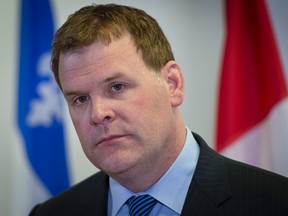 Canadian Foreign Minister John Baird talks during a press conference before a meeting with the leaders of the Ukrainian community in Montreal on March 7, 2014. (JOEL LEMAY/QMI AGENCY)