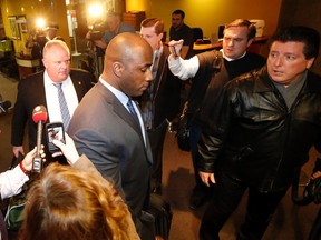 Mayor Rob Ford leaving a city council meeting on March 20. 2014. (Michael Peake/Toronto Sun)