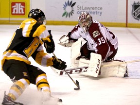 Kingston Frontenacs' Robert Polesello gets a shot on Peterborough Petes goalie Michael Giugovaz during Ontario Hockey League action at the Rogers K-Rock Centre on Jan. 3. The teams open a first-round playoff series tonight at the Rogers K-Rock Centre. (Ian MacAlpine/The Whig-Standard)
