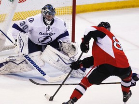 Ottawa Senators' Ales Hemsky, 83, looks to beat Tampa Bay Lightning's Ben Bishop, left, to make it 3-3 in the second period during NHL action at the Canadian Tire Centre in Ottawa, Ont. on Thursday March 20, 2014. Darren Brown/Ottawa Sun/QMI Agency