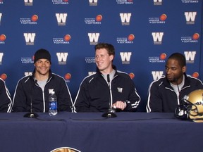 New Bombers (left to right) Korey Banks, Nick Moore and Drew Willy, are joined at a press conference by returnee Cory Watson on Thursday.