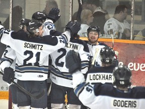 The Steinbach Pistons celebrate their win in Game 7 of the Addison Division semifinal series, 4-0, on Mar. 20. (KEVIN HIRSCHFIELD/THE GRAPHIC)