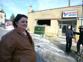 Laurie Markham of Theatre Woodstock stands in front of their burned out storage room for set, props and costumes. HEATHER RIVERS/WOODSTOCK SENTINEL-REVIEW