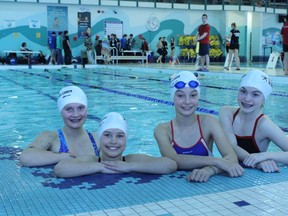 Angelina Nikicevic (from left), Sophie Vance, Madelyn Lux and Jessica Flynn were four of the local Blue Fins who participated in the Junior Lifeguard provincial championship at the TransAlta Tri Leisure Centre on March 15 and 16. - Karen Haynes, Reporter/Examiner