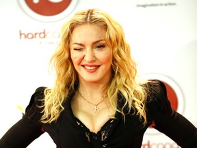 Madonna arrives to launch her new Toronto gym Hard Candy and poses for media on Tuesday February 11, 2014. Michael Peake/QMI Agency