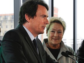 Pierre Karl Peladeau and Parti Quebecois Leader Pauline Marois during a press conference in Montreal, Friday, March 21, 2014. (DIDIER DEBUSSCHERE/QMI Agency)