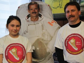 Faith Abbey, 10, and her father Dave, both of London, Ont., launched their fundraising walk for childhood cancer in the office of Sarnia Mayor Mike Bradley Friday, March 21, 2014. The pair will walk from Faith's London school to Sarnia's King George VI Public School. Retired Canadian astronaut Chris Hadfield attended the school and has thrown his support behind the fundraiser.  (BARBARA SIMPSON, The Observer)