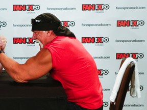 Toronto Mayor Rob Ford and wrestling legend Hulk Hogan engage in a friendly arm wrestle to kick off Fan Expo Canada weekend at the Intercontinental Hotel in downtown Toronto Friday August 23, 2013. (Ernest Doroszuk/Toronto Sun)