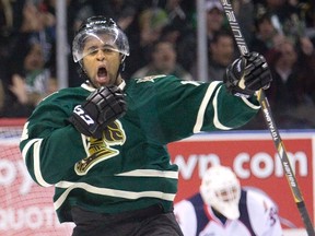 London Knights? Gemel Smith celebrates after blasting a slap shot past Windsor Spitfires goalie Alex Fotinos during Game 1 of their OHL playoff series on Friday at Budweiser Gardens.  (DEREK RUTTAN, The London Free Press)
