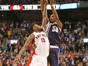 Kevin Durant nails his game-winning three-pointer over Amir Johnson. (Jack Boland, Toronto Sun)