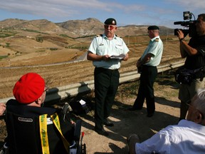 Lt.-Col. (Ret.) Skip Simpson speaks about the Battle of Assoro, Sicily (background) during the Hastings and Prince Edward Regiment's 2005 pilgrimage to the village. The Department of National Defence is now granting the regiment its 42nd battle honour, this time for service in the South African War of 1899 to 1902.