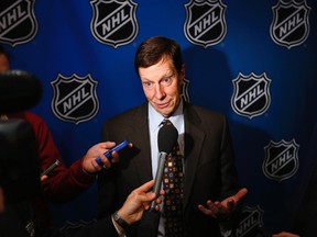 Nashville Predators general manager, David Poile, speaks to media before Commissioner Gary Bettman announces the end of labor negotiations between the NHL and the NHL Players Association (NHLPA) in New York, January 9, 2013.
REUTERS photo.