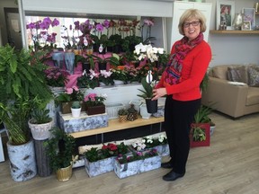Irene Seaman poses at Academy Florists' new Corydon location after the shop was named Winnipeg's Best Florist in a Your Winnipeg poll. (TESSA VANDERHART/Winnipeg Sun)