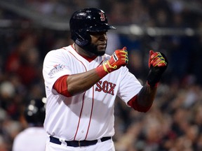 Boston Red Sox designated hitter David Ortiz reacts after scoring in the fourth inning against the St. Louis Cardinals during Game 6 of the 2013 World Series at Fenway Park. (Robert Deutsch-USA TODAY Sports)