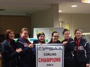 The Marymount Regals proudly show the OFSAA girls curling championship banner they earned Saturday with an 8-3 win over Brockville.