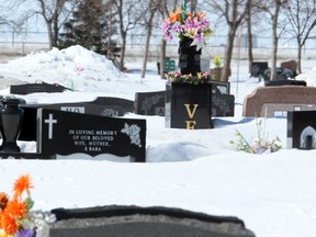 Grave markers are seen in Brookside Cemetery in Winnipeg, Man. Sunday March 23, 2014.
Brian Donogh/Winnipeg Sun/QMI Agency