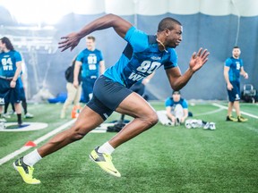 Devon Bailey works out during the CFL combine at the Varsity Centre in Toronto on March 23, 2014. (Ernest Doroszuk/QMI Agency)