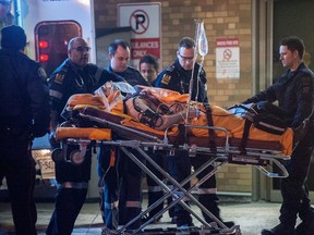 A man is taken to hospital Sunday night after being shot outside Dilly's Sports Bar on Wilson Ave. near Dufferin St. (Victor Biro/Special to the Toronto Sun)