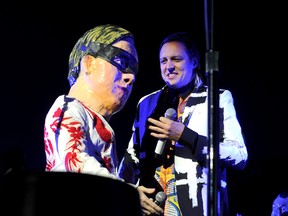 Musician Win Butler of Arcade Fire performs onstage during The 24th Annual KROQ Almost Acoustic Christmas at The Shrine Auditorium on December 8, 2013 in Los Angeles, California.  Kevin Winter/Getty Images for CBS Radio/AFP