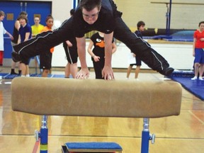 County Central High School’s gymnastics program remains popular after more than 30 years. Gym teacher Angie Seaman picked up the reigns from her dad, former gym teacher John Seaman, who still volunteers his time with the program, which runs for three weeks in March. Here, Corbie Chase leaps over the vault.  
Simon Ducatel Vulcan Advocate