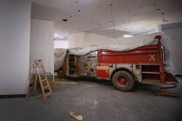 New York City Fire Department's (FDNY) Engine Company 21 fire truck, which will be part of the permanent display, is seen inside the 911 Memorial Museum, currently still under construction, at the World Trade Center site in New York, July 2, 2013. The Museum is scheduled to be opened to the public in the Spring of 2014.   REUTERS/Mike Segar    (UNITED STATES - Tags: DISASTER BUSINESS CONSTRUCTION)