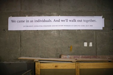 A message is taped to a wall inside the 911 Memorial Museum, which is under construction, at the World Trade Center site in New York, July 2, 2013. The Museum is scheduled to be opened to the public in the Spring of 2014.   REUTERS/Mike Segar    (UNITED STATES - Tags: DISASTER BUSINESS CONSTRUCTION)