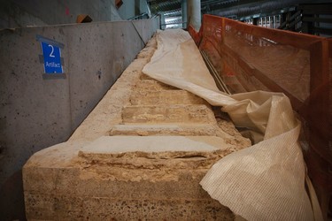 The "Survivor's Stairs" are seen inside the 911 Memorial Museum, which is under construction, at the World Trade Center site in New York, July 2, 2013. On September 11, 2001, this staircase offered a clear exit from the World Trade Center Plaza to Vesey Street, providing a means of escape for hundreds fleeing from the towers after the attacks and became symbolic of survival and acquired the name "Survivor's Stairs". The 911 Memorial Museum is scheduled to be opened to the public in the Spring of 2014.   REUTERS/Mike Segar    (UNITED STATES - Tags: DISASTER BUSINESS CONSTRUCTION)
