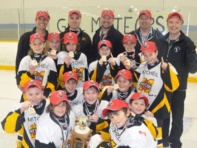 The Mitchell Atom reps won the Ontario Minor Hockey Association (OMHA) ‘CC’ championship on home ice Saturday, March 22 with a 4-3 win over Wasaga Beach to claim the best-of-five series in three straight games. Team members are (back row, left to right): Bud Schoonderwoerd (trainer), James Morrison (coach), Joe Porter (assistant coach), Rob Boville (assistant coach), Rick Knill (trainer). Third row (left): Seth Huygen, Wyatt Huitema, Evan Morrison, Dayten Porter, Joey Hill, Kase Schoonderwoerd. Second row (left): Sam Snyders, Connor Lockhart, Carter Preszcator. Front (left): Bradley Boville, Connor MacLean, Greg Reidy, Mark Knill. ANDY BADER/MITCHELL ADVOCATE