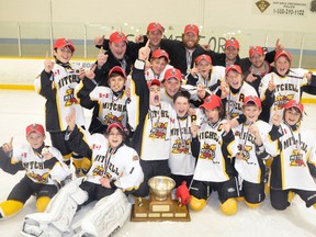 The Mitchell Pee Wee reps won the Ontario Minor Hockey Association (OMHA) ‘CC’ championship on home ice Sunday, March 22 with a 4-1 win over Schomberg to claim the best-of-five series in four games. Team members are (back row, left to right): James McDougall (assistant coach), Mike Feltz (assistant coach), Kyle Verberne (coach), Craig Kelly (trainer) and Brad Walt (manager). Second row (left): Eric Gettler, Devin Fenwick, Connor Weir, Carter Schoonderwoerd, Curtis Eidt, Jacob Rauser, Jarett Vogels. Front row (left): Jackson MacArthur, Quinton Duncan, Drew MacLean, Reid Ramseyer, Ryan Murray, Trevor DeJong and Ryan Harmer.  ANDY BADER/MITCHELL ADVOCATE