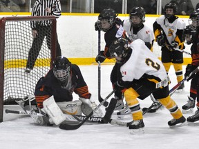 Drew Scherbarth (2) of the Mitchell Atom AE’s was stopped at point blank range by North Middlesex goalie Jacob Trudgeon during Game 2 of their OMHA AE Group 4/5 final series last Friday, March 21. Mitchell lost 3-1. ANDY BADER/MITCHELL ADVOCATE